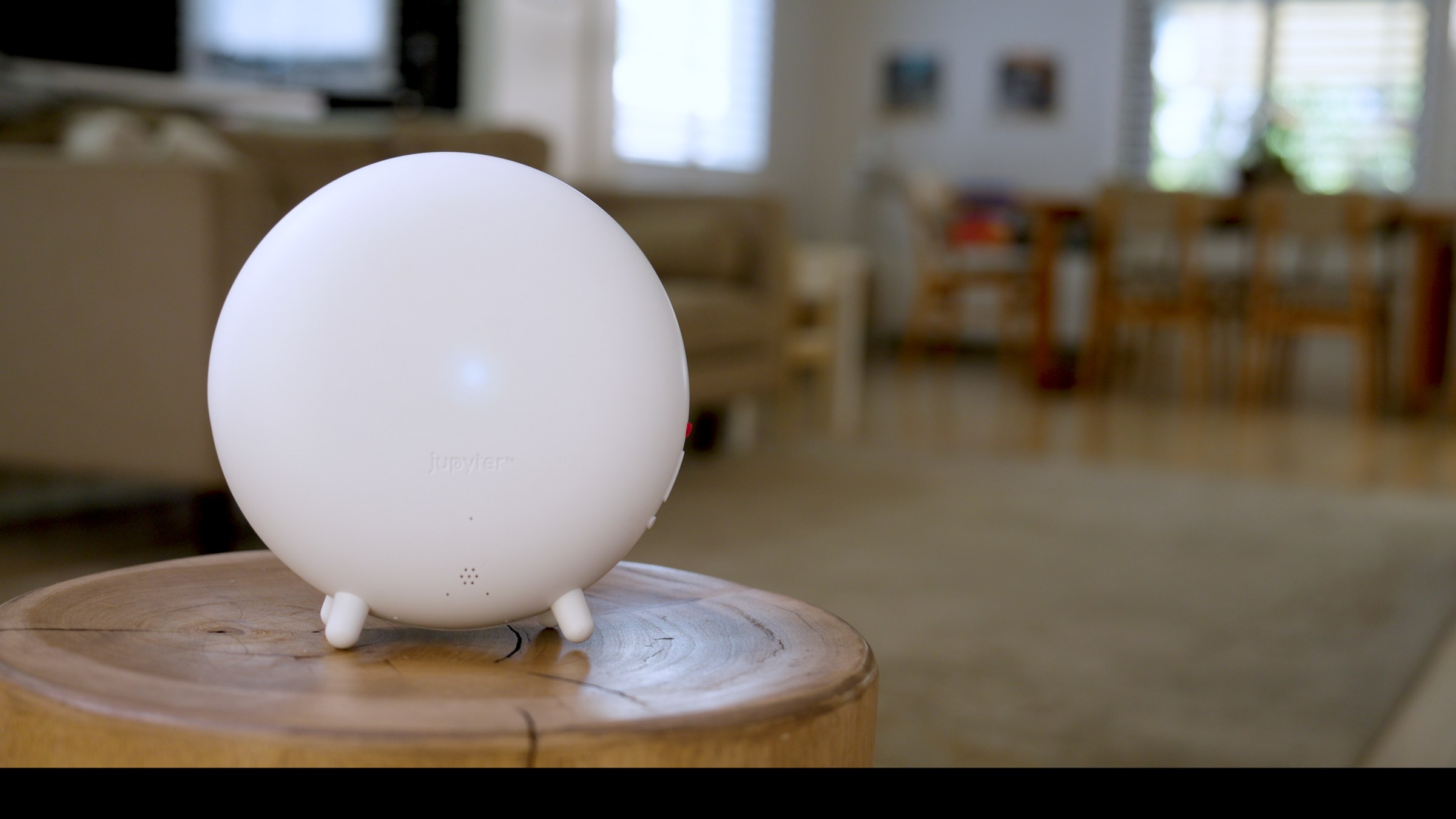 The Indoor Halo on a timber side table in a living room